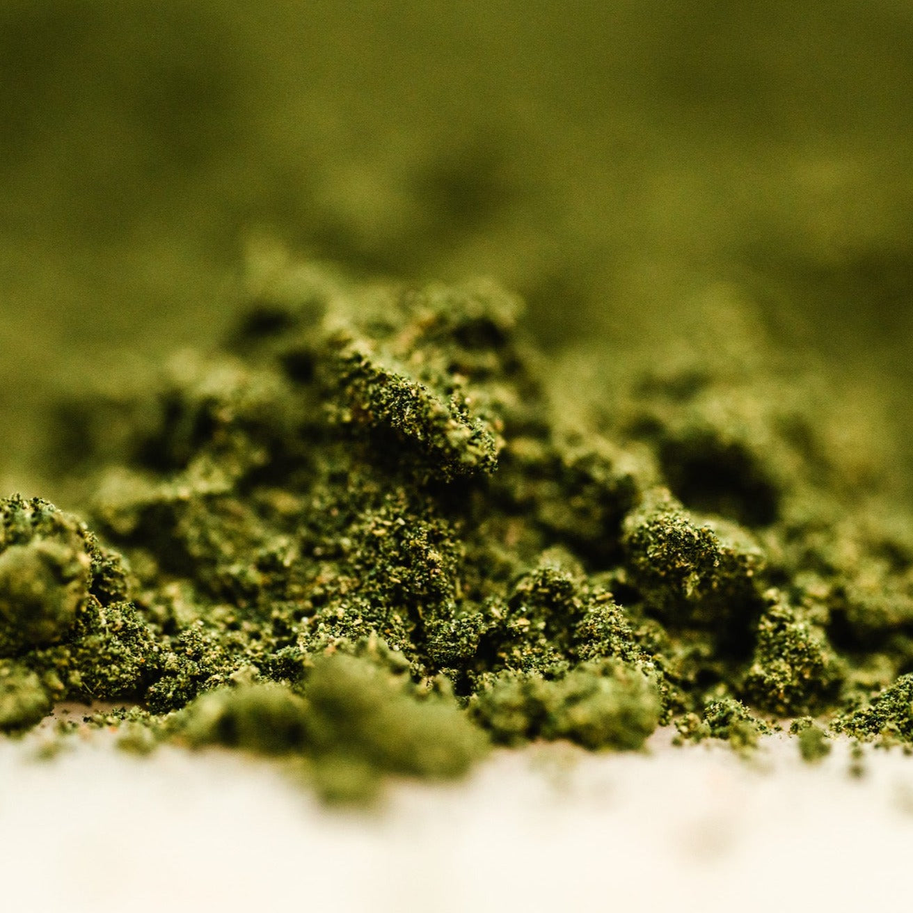 A close-up photo of Fiddy Shades of Green Juice, dark green, pure plant, botanical blend.